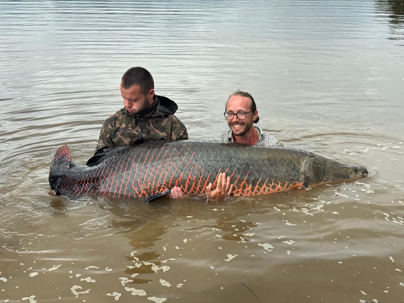 Group with a trophy Arapaima