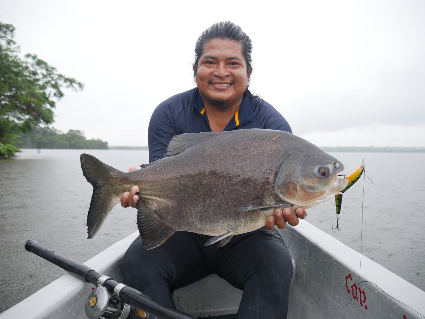 Angler with a pacu catch